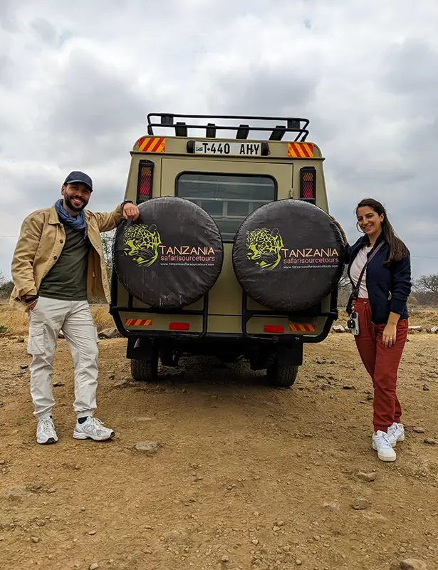 Travelers on a premium game drive vehicle during a luxury safari in Tanzania