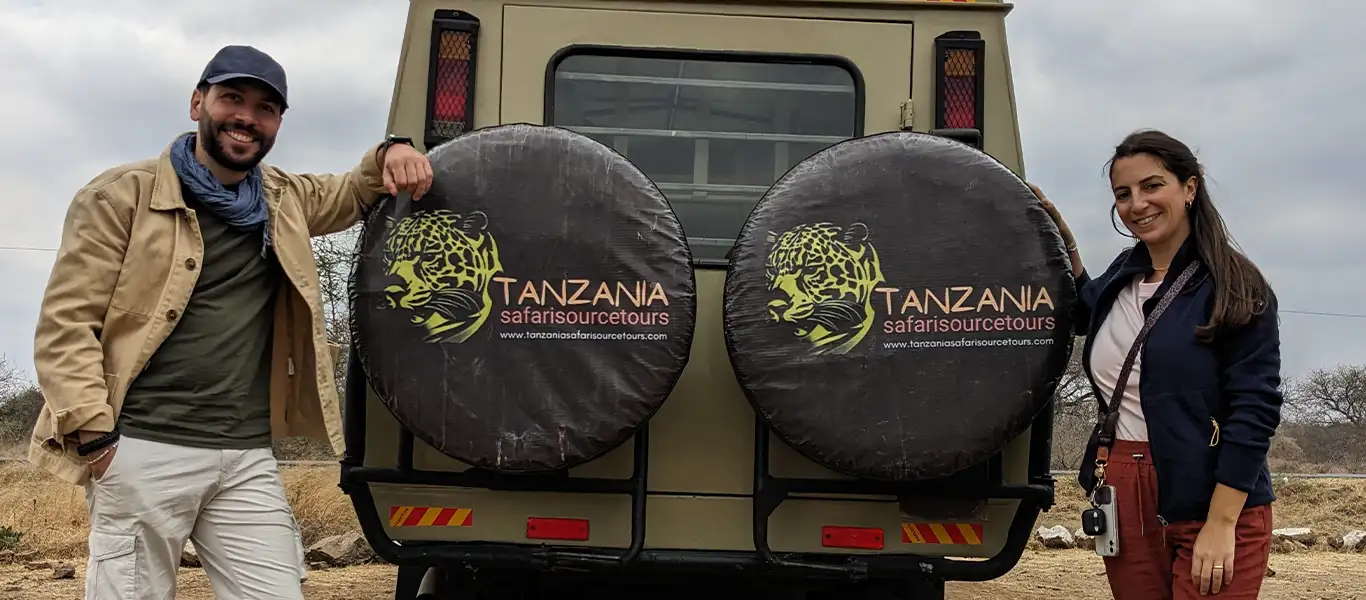 Travelers reviewing travel plans in Arusha